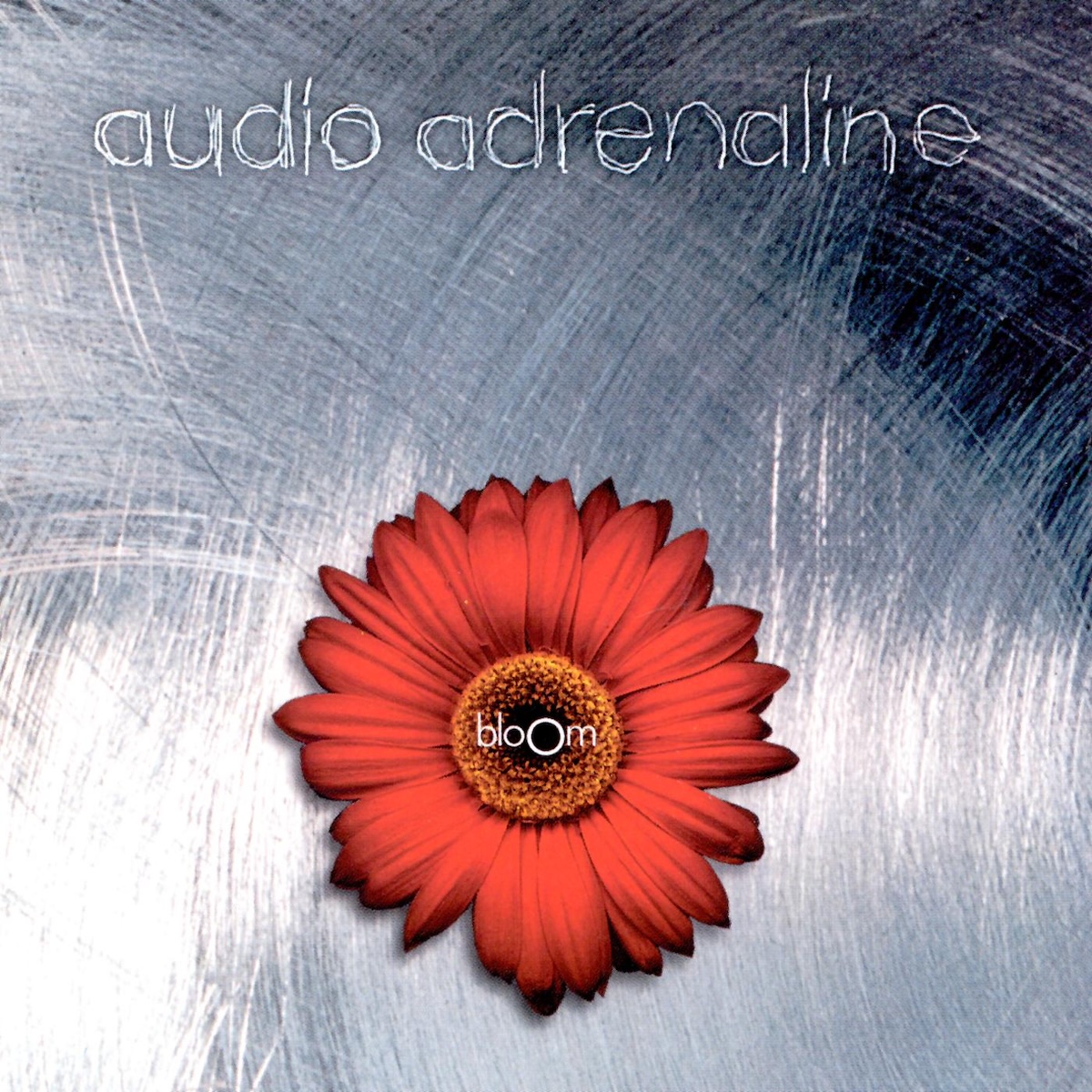 Album Art of Audio Adrenaline's Bloom album - The background seems to be some sort of shiny, brushed steel surface. In a font that looks like scratched metal, the band's name is at the top with a bit of a dark shadow around the lettering. In the bottom vertically and centered in the middle horizontally, a red sunflower graphic is over the background with a muted drop shadow. In the middle of the sunflower in lowercase is the album title in white, with the last 'o' bigger than the rest of the letters.