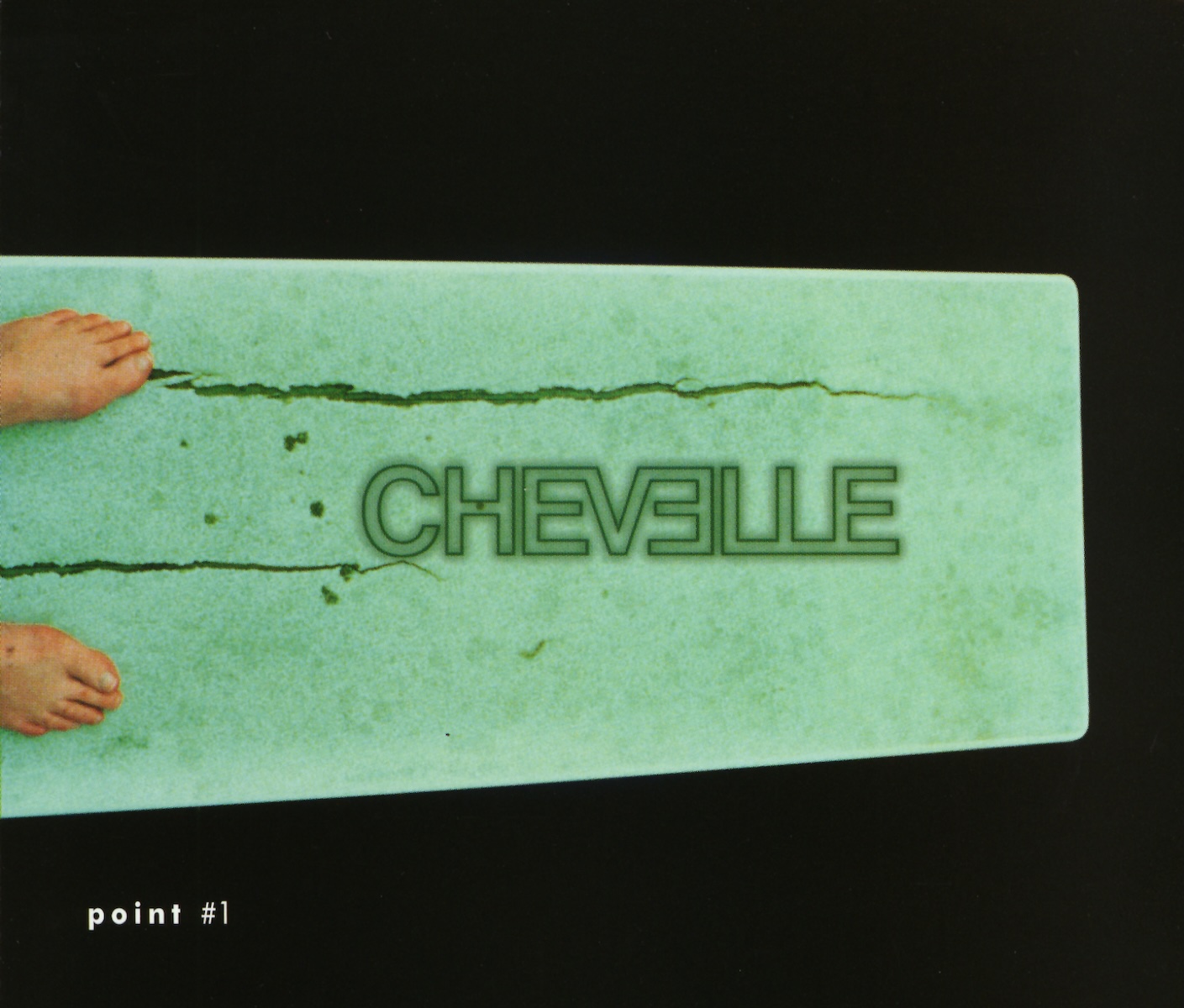 Album Art of Chevelle's Point #1 album - On a black background, the middle is a light green color and looks like either a green marble or some sort of rug, though there's dark gouges/cracks in it and a few holes. On the left edge there is the tops of two feet poking into the frame, which is why I think it's a bit of floor, carpet, or maybe a bathtub? With the rest of it black, it's hard to tell. Printed above the green in a darker green text is the band's name, with the second 'e' turned around to mirror the 'e' on the other side of the 'v'. And in the blackness in the bottom left is printed the album title in small, white text.