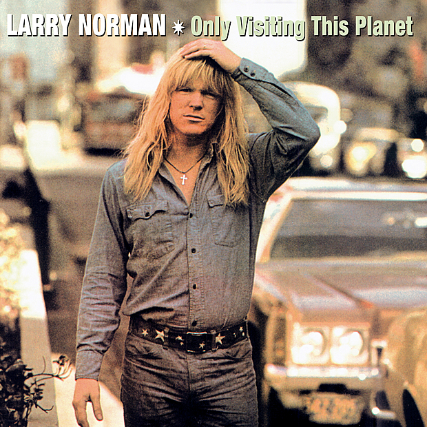 Alternative Album Art of Larry Norman's Only Visiting This Planet album - The whole area is filled with a very blown out, blown up photo of Larry Norman standing on the sidewalk. The picture has a red/orange hue and looks kinda flat and grainy, such that most of his face is all the same color. At the top, it says the artist's name on top of the photo in bold white text, with a star icon next to it, and then the album title in light green to the right.