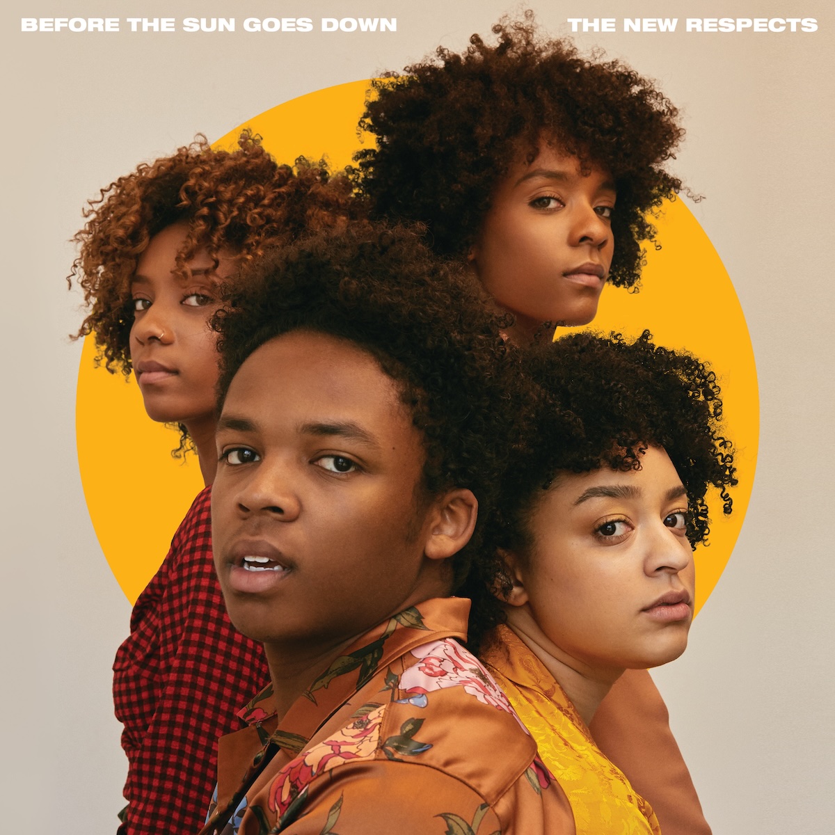 Album Art of The New Respects's Before The Sun Goes Down album - Four young black persons, one male and three female, are shown in this photo looking at the camera from the side, with two of them facing to the left and right side of the frame and their backs to each other. Behind them is a beige background with an orange circle in the middle behind them. At the top, it has in small white, heavy print the album title in the left side and the band name in the right side.