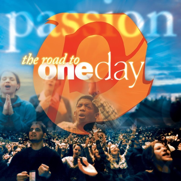 Album Art of Passion's The Road To OneDay album - At the bottom, a photo of a large crowd of young people, mosdtly with their eyes closed, heads looking up, and some with hands raised in the air. In the middle, semi-transparent, is a few more people with hands clasped together prayerfully or with hands raised, and they look like they're singing. The picture at the bottom continues to be the background, with a woods and the blue sky stretching across the album cover. In the middle, an orange circle with 3 scoop edges has a red, italic 'p' inside it, and on top of it is written the album title, with 'oneday' being bigger than the rest, and 'one' is much more bolder than 'day'. At the top, 'passion' is written in lowercase in a very soft white transparent of the rest of the sky and the orange circle.