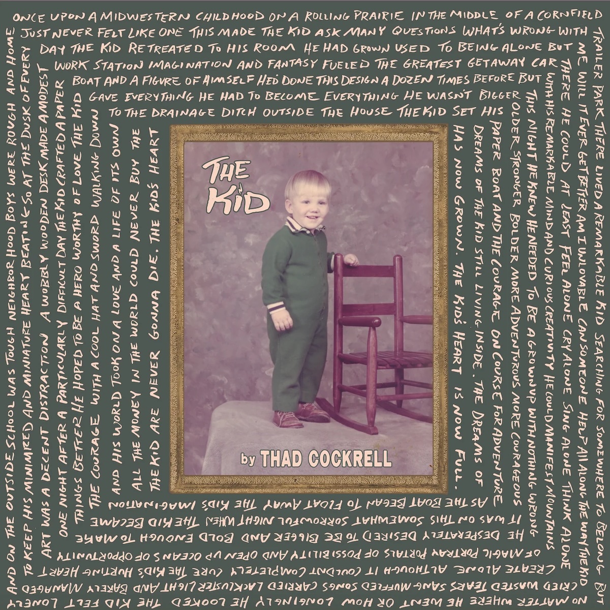 Album Art of Thad Cockrell's The Kid album - In the middle of the green background is an old photo in a golden frame of a kid, maye five years old, with an awed smile and a bright green onesie. He's standing next to a brown kids rocking chair and his left arm is on the top of it. He looks like he might be standing on a bed or some sort of platform against a mottled background.</body></html>